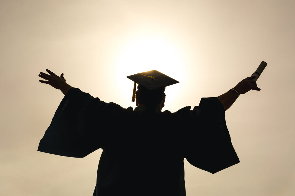 Maya Ellison-Reyes celebrating at graduation